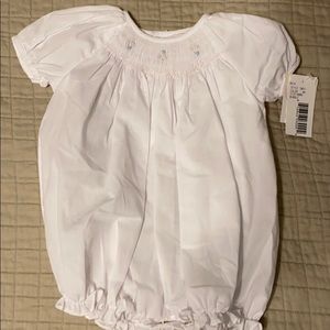 White one piece with bonnet